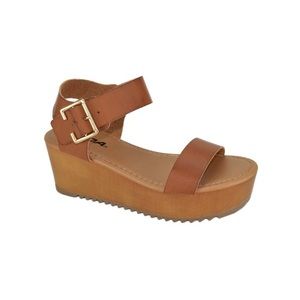 Brown/tan soda platform heels.